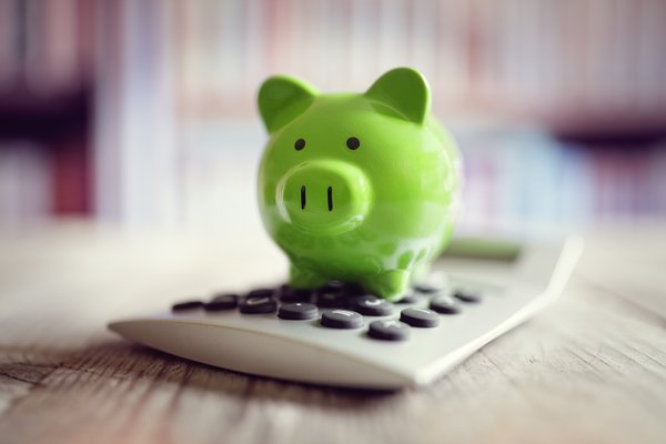 Piggy bank on a calculator.