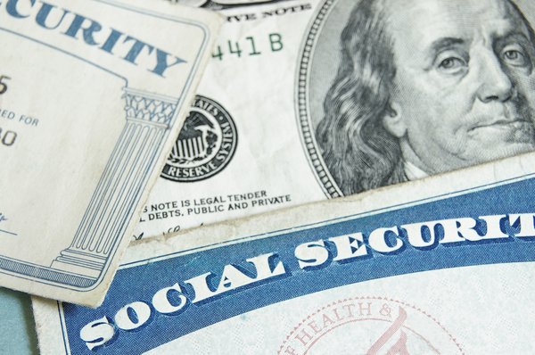 Social Security cards and money.