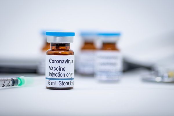 Syringe and coronavirus vaccine injectable.