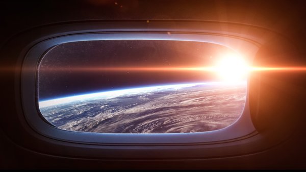 View out the window of a vehicle in space flight.