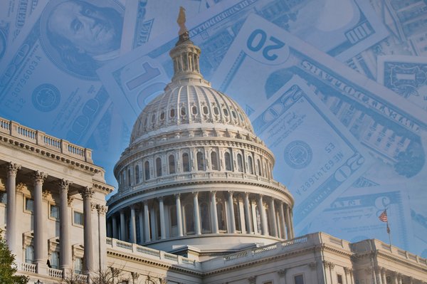 An image of the U.S. Capitol building with a background of currency.