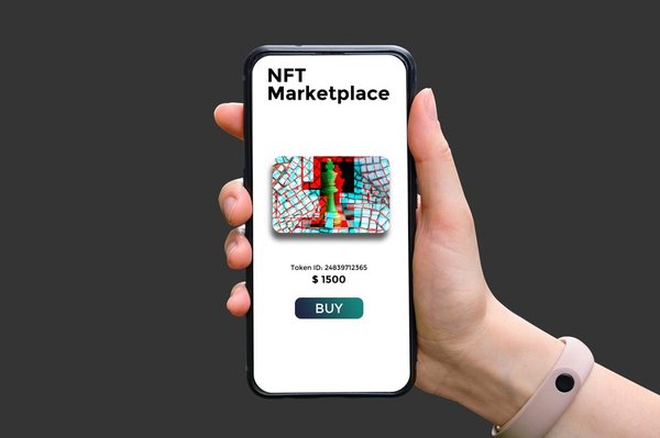 A person holding a phone displaying an NFT marketplace.