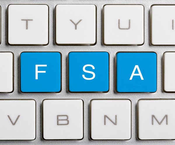 FSA letters on a keyboard in blue.