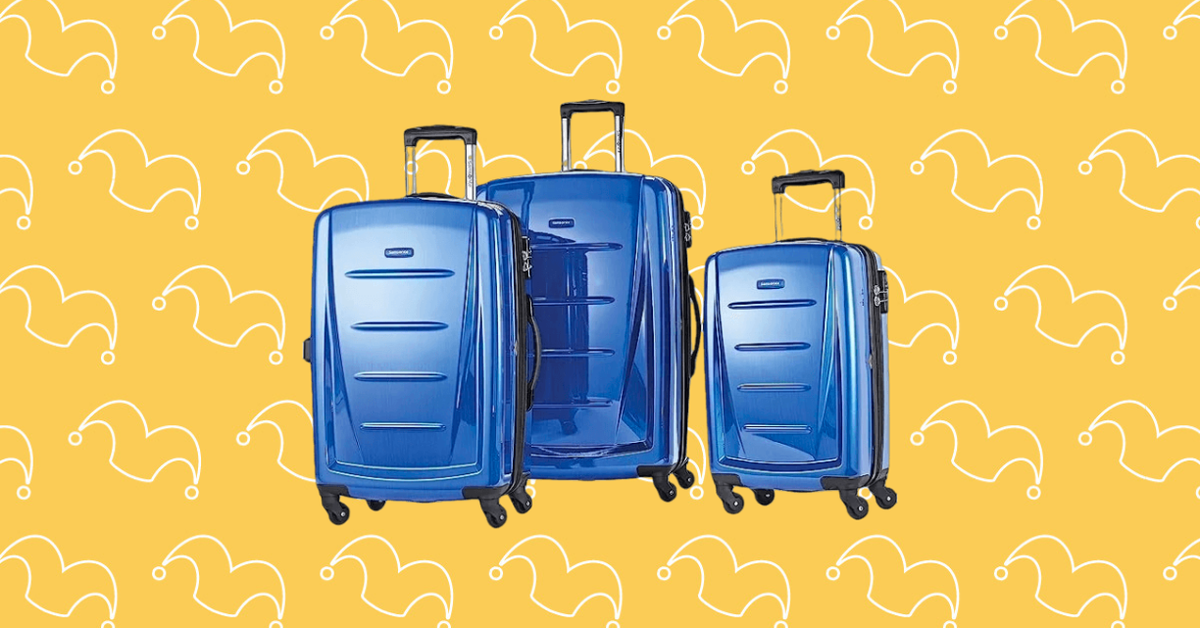 Three blue rolling suitcases against a yellow background