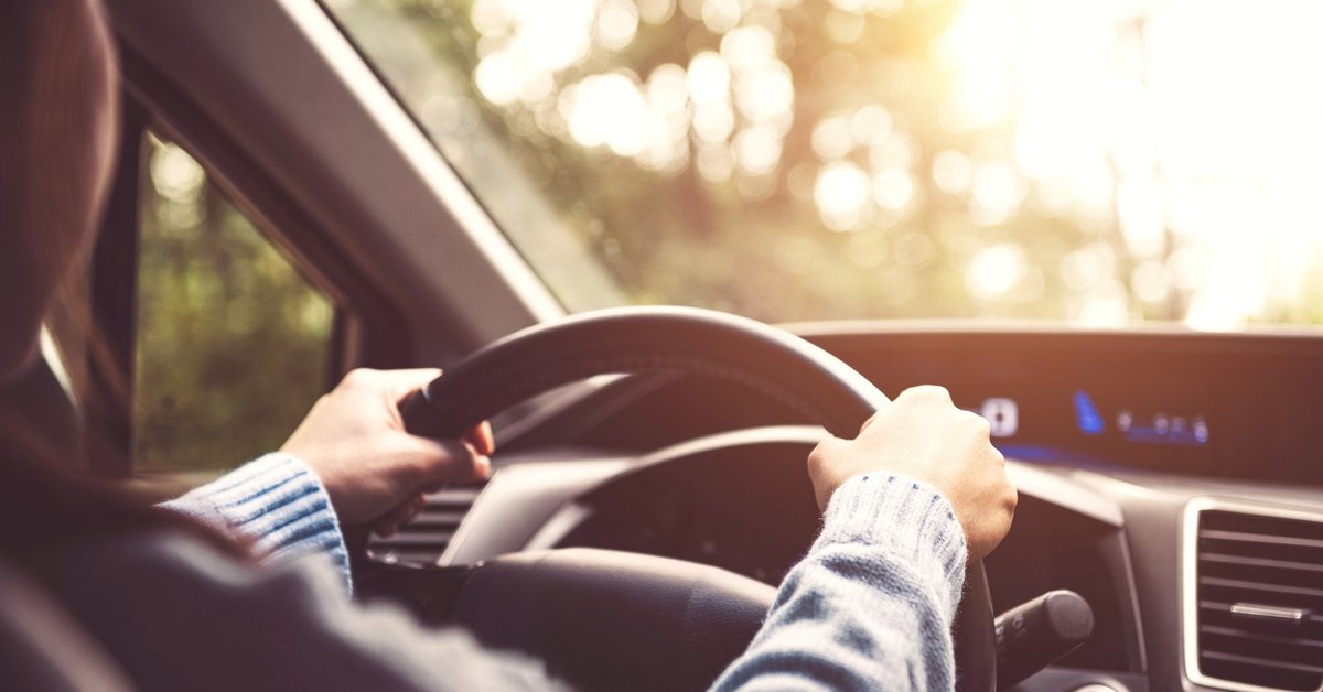 Man driving a car.