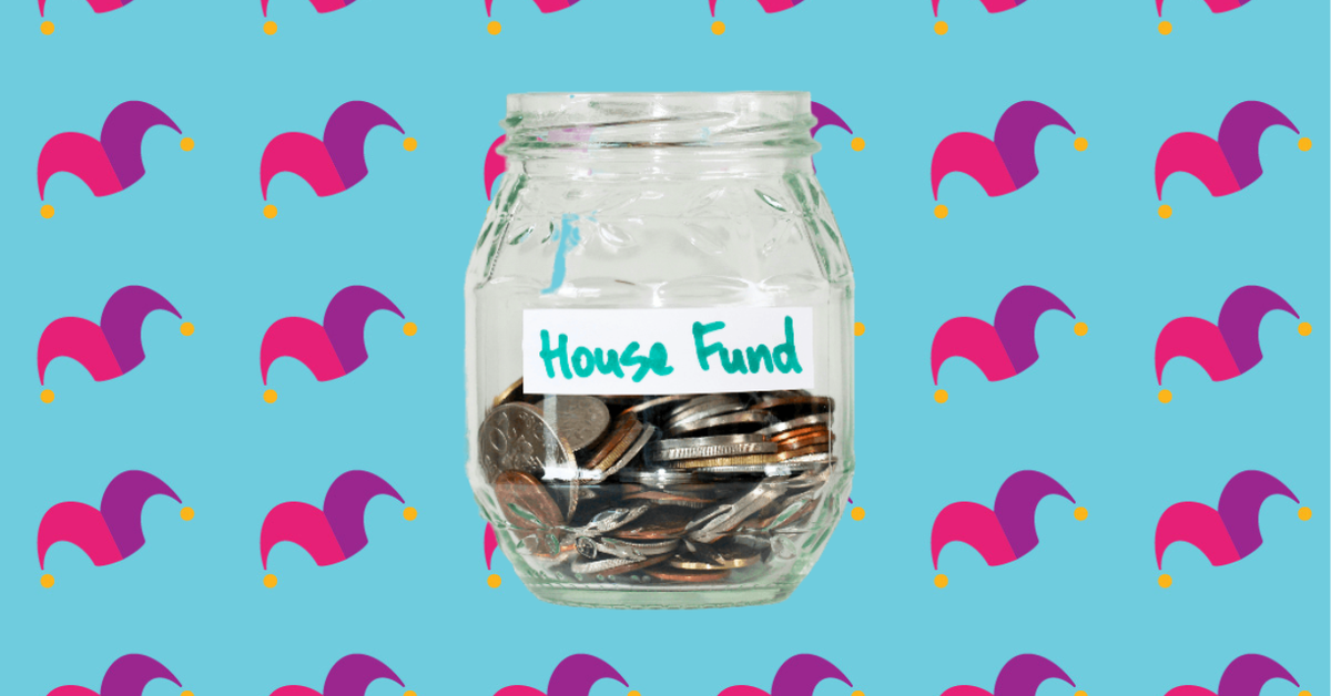 A glass jar that reads House Fund half filled with coins