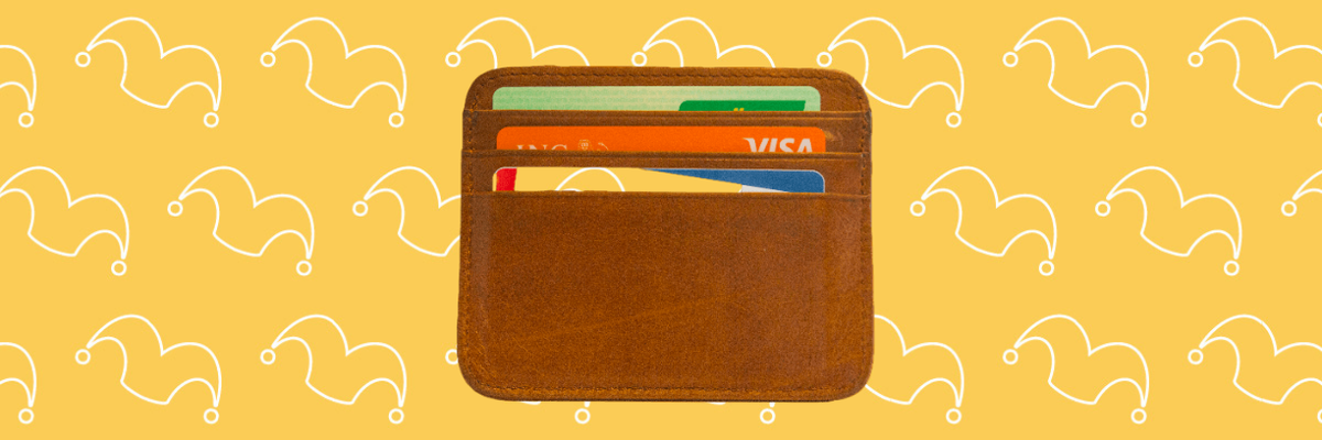A small wallet showing it holding three credit cards