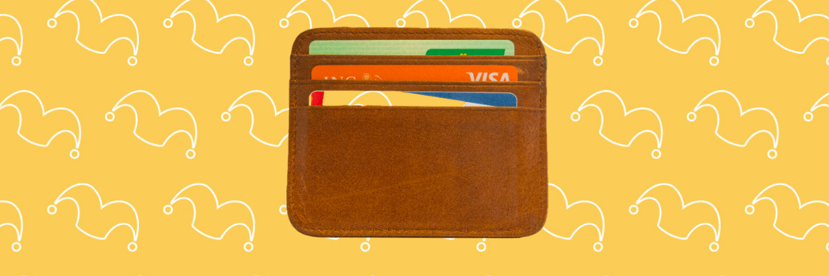 A small wallet showing it holding three credit cards