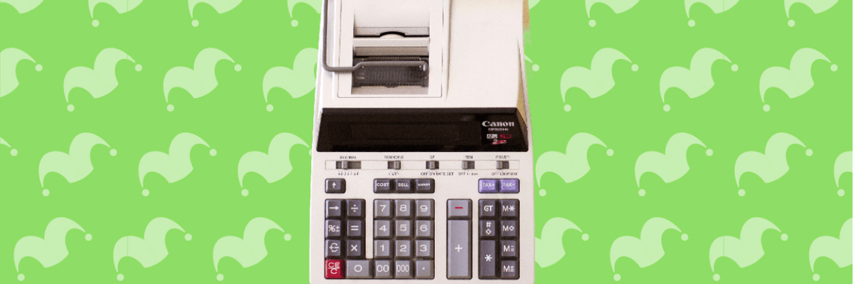A calculator against a green background