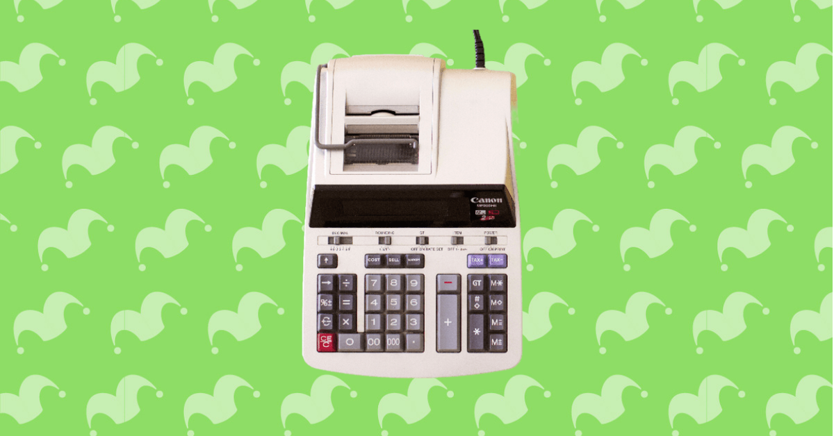 A calculator against a green background