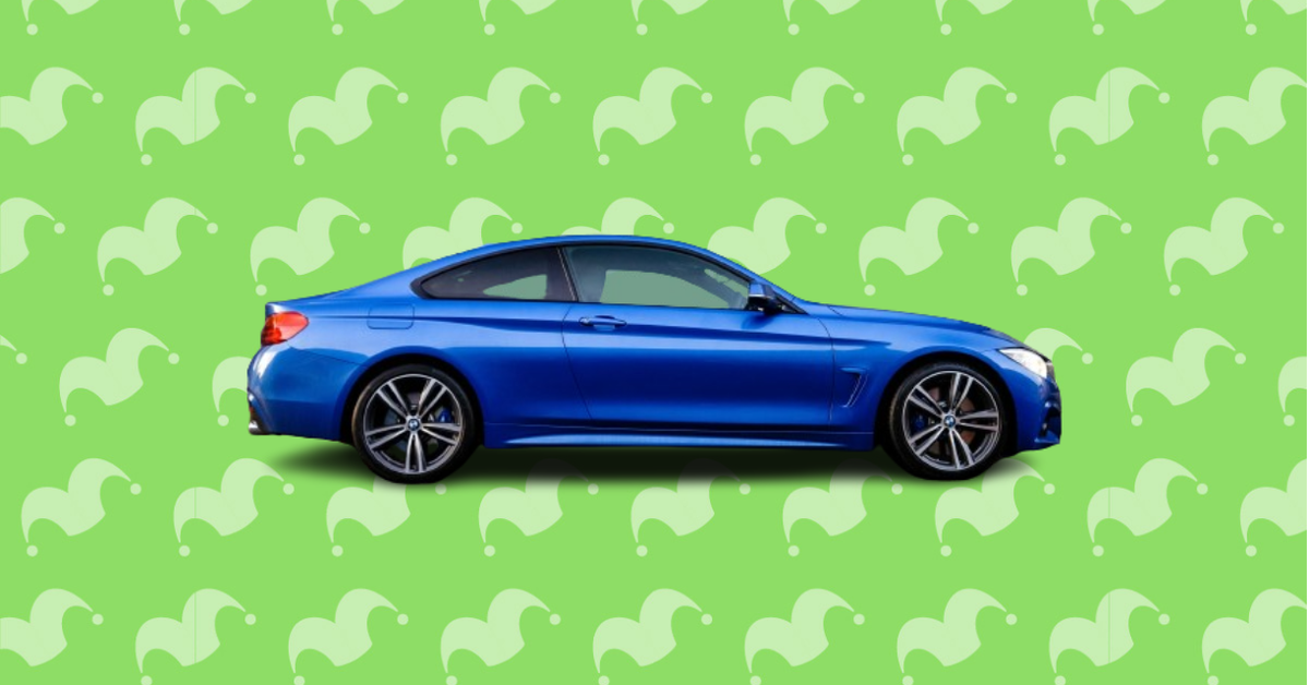 A blue sports car against a green background