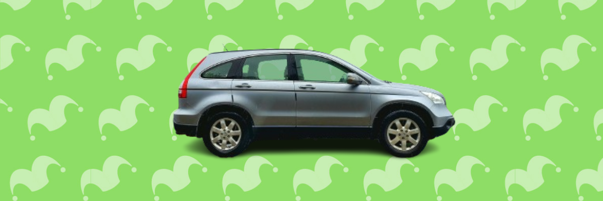 A small SUV against a green background