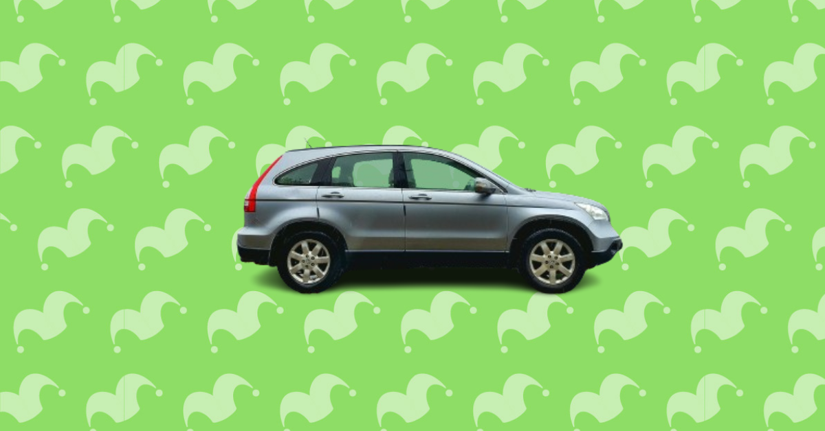 A small SUV against a green background