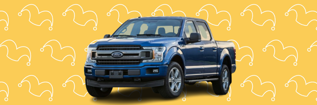 A blue pickup truck against a yellow background