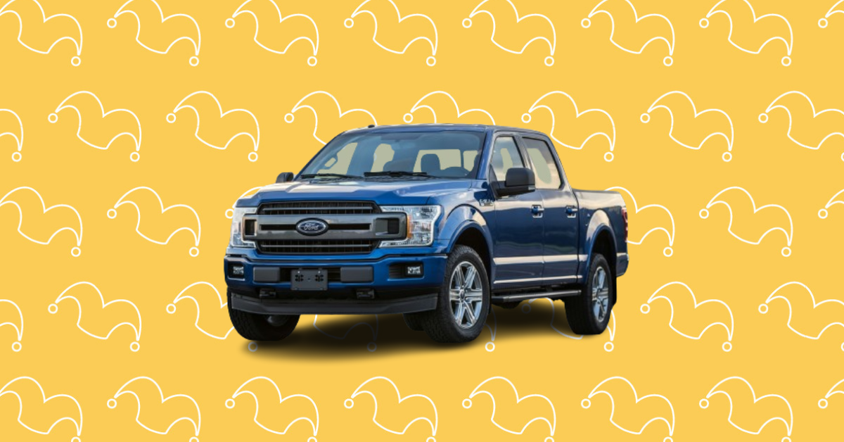 A blue pickup truck against a yellow background