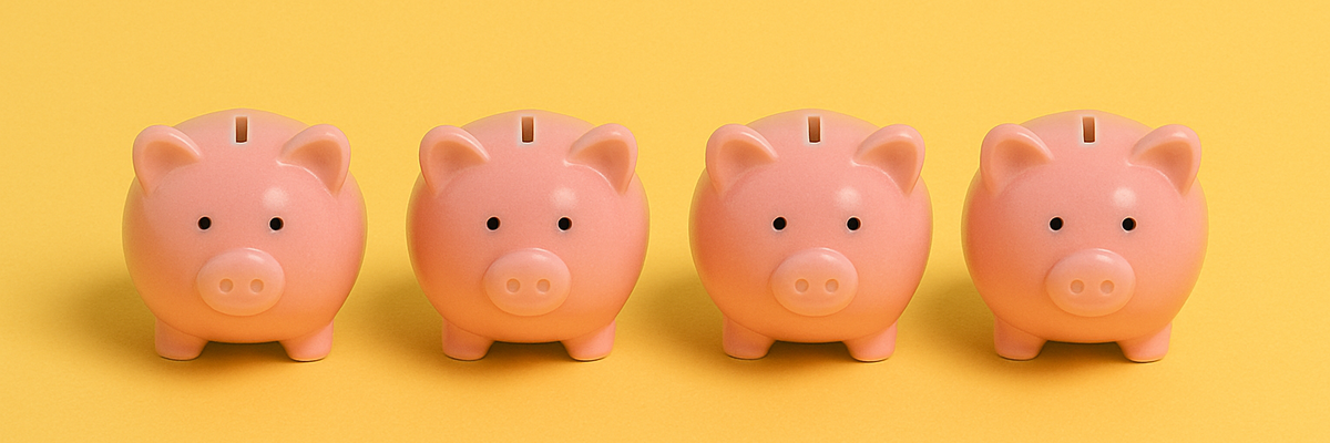Four pink piggy banks in a row against yellow background.