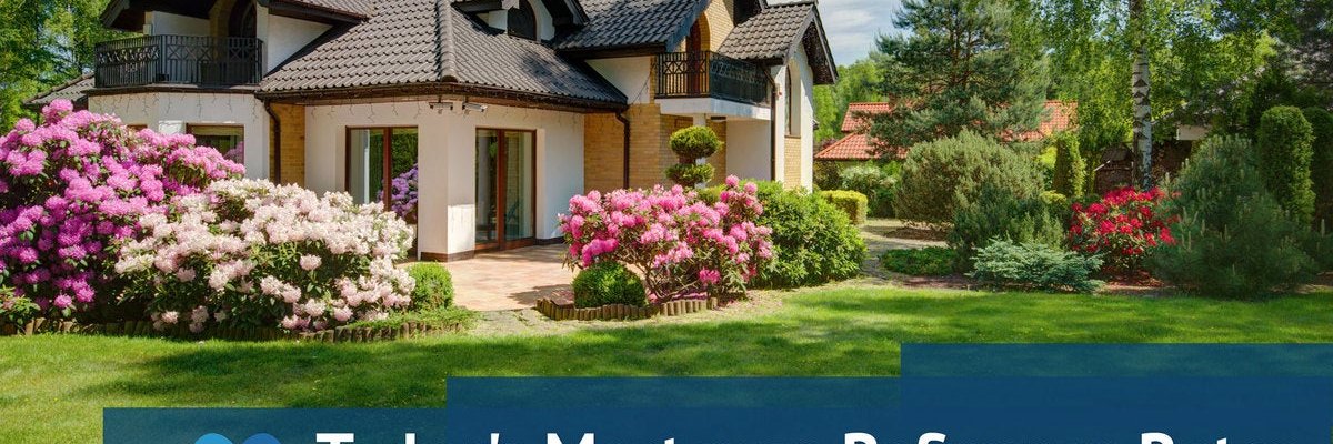 Large home surrounded by greenery with Today's Mortgage Refinance Rates graphic.