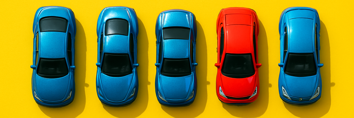 Five toy cars in a row, blue and red against a yellow background.