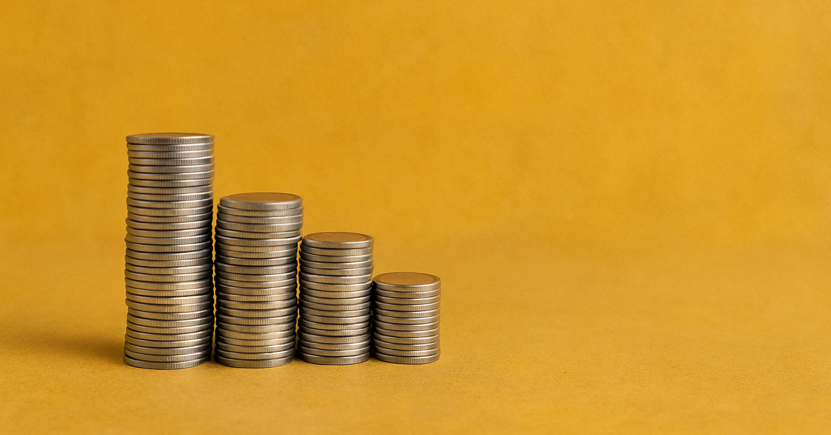 Four stacks of coins in descending height.