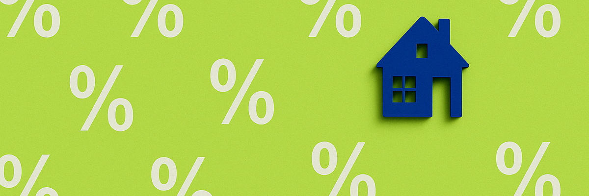 A small house sits on a background of percentage signs.