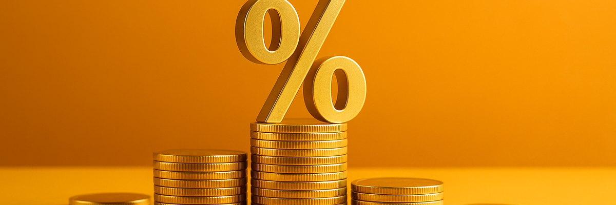Stacks of coins and a percentage sign.