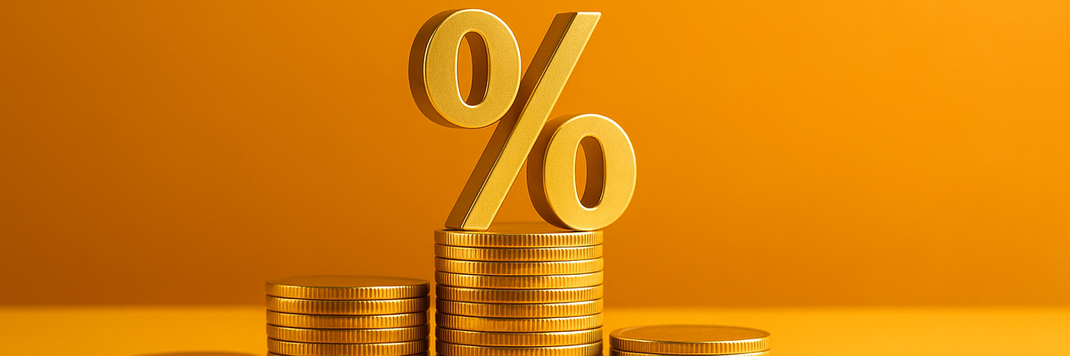 Stacks of coins and a percentage sign.