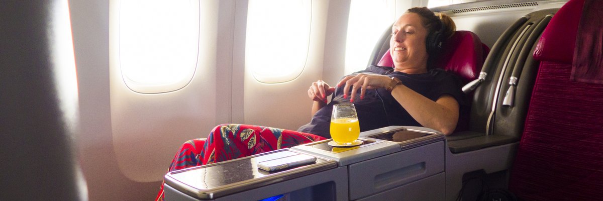 Airplane passenger flying business class