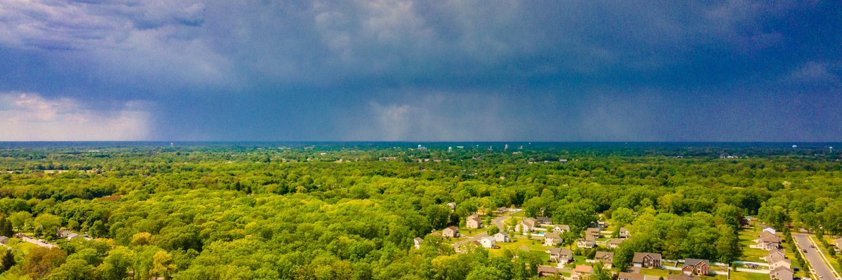 An aerial view of a storm in the distance on the horizon in Vineland, New Jersey.