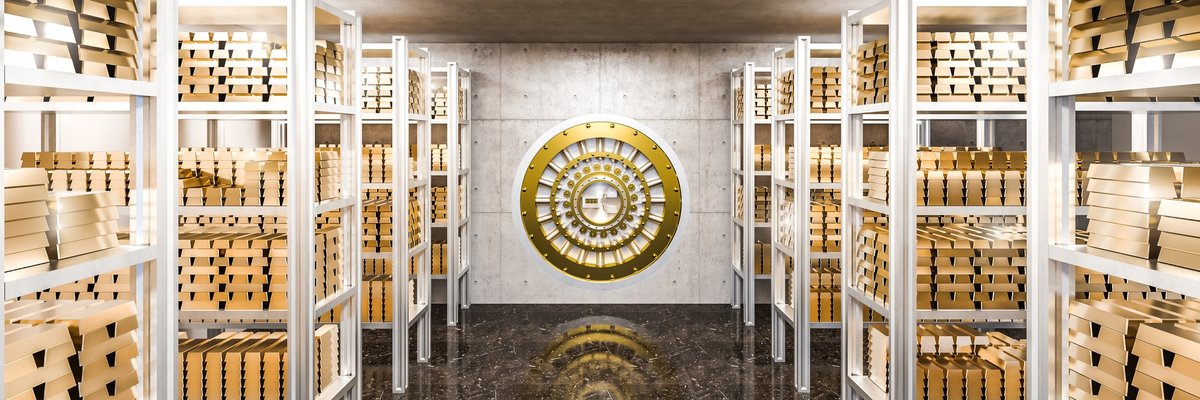 A bank vault filled with gold bars.