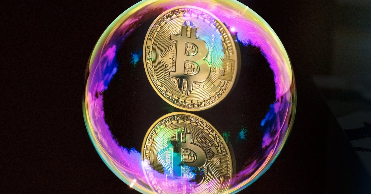 A coin with the Bitcoin B inside of a bubble.
