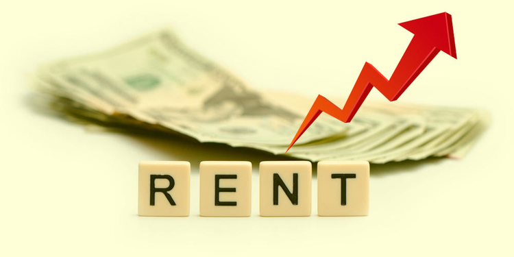 An illustration of rent going up, along with a stack of paper money.