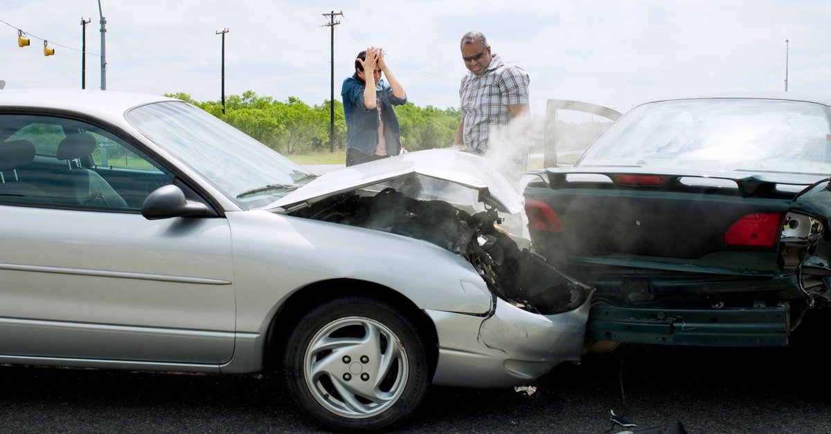 Car accident between two vehicles on the road.