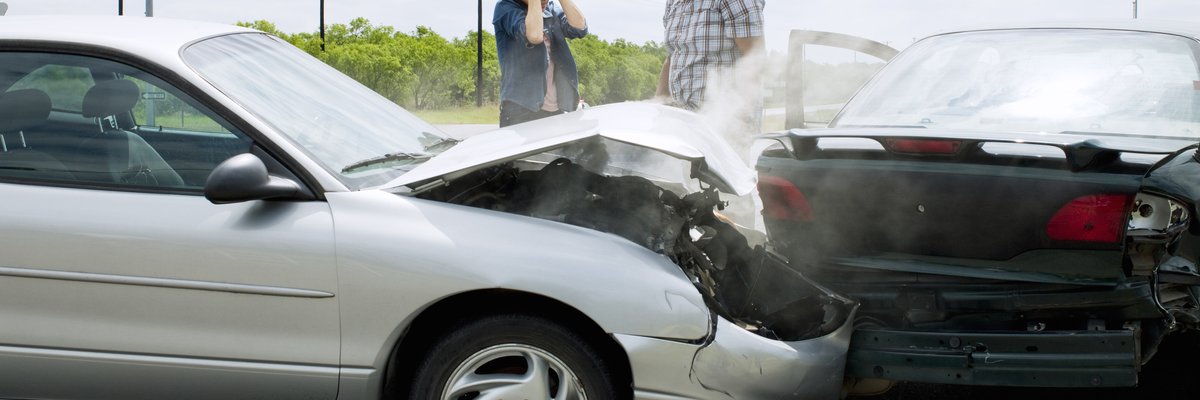 Car accident between two vehicles on the road.