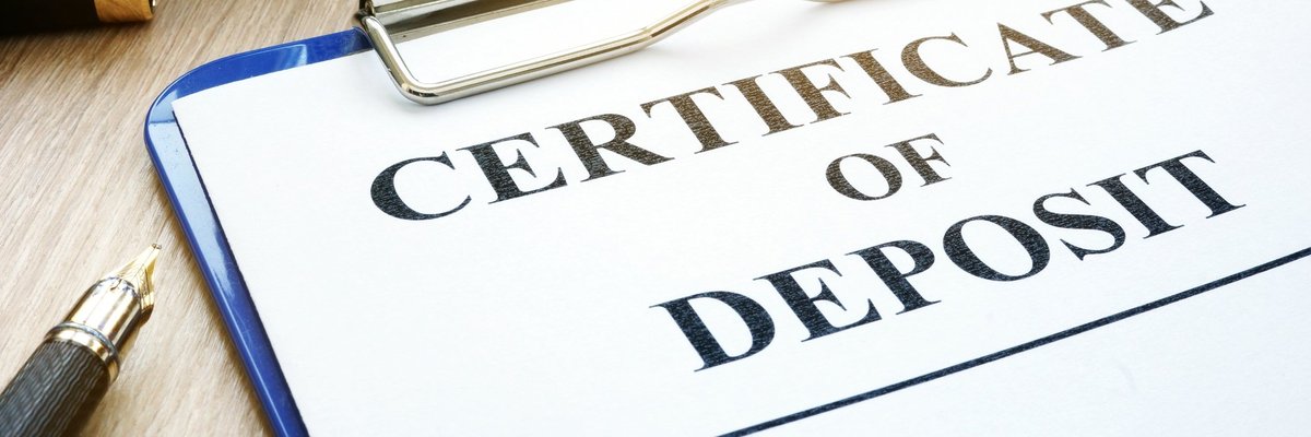 Certificate of deposit sign on a clipboard.