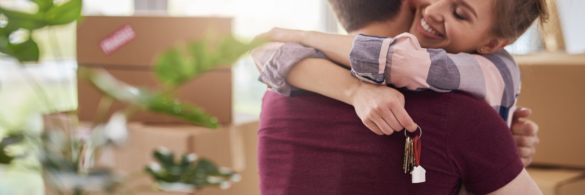 Couple Hugging With Keys.jpg