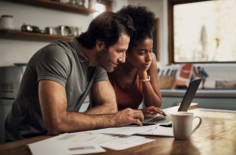 Couple Studying Laptop
