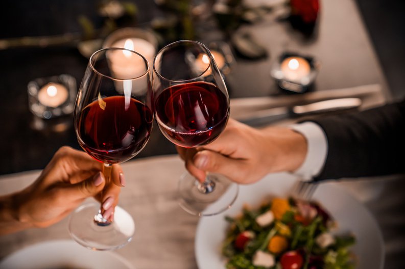 Couple Toasting With Wine