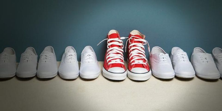 Shoes lined up in a row on the floor