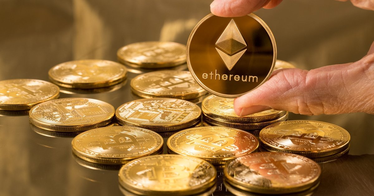 A pile of gold coins and a hand holding one up that says "Ethereum."