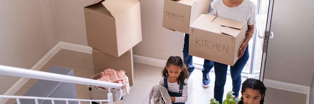 A young family move into their new home.