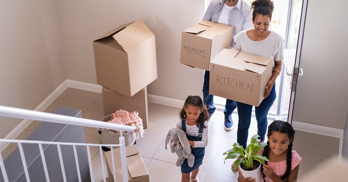 A young family move into their new home.