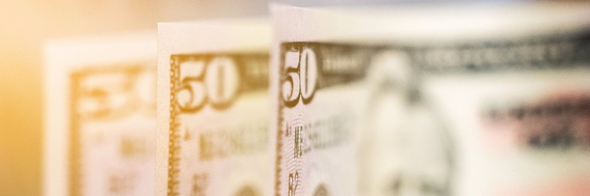 Three 50 dollar bills