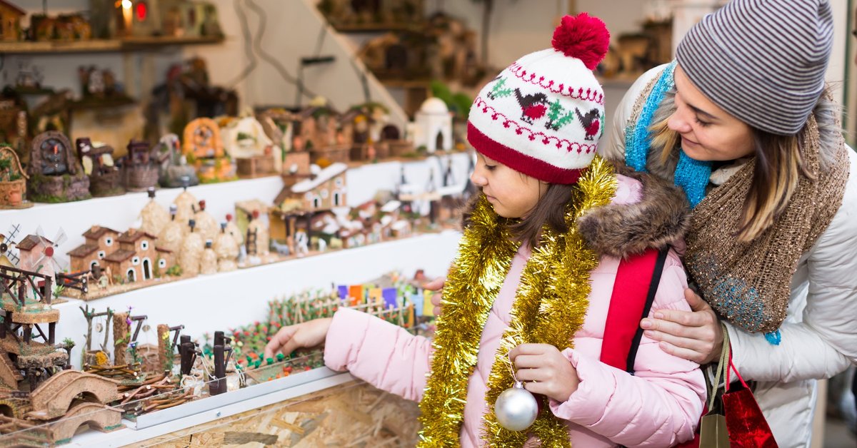 A mother and daughter going Christmas shopping.
