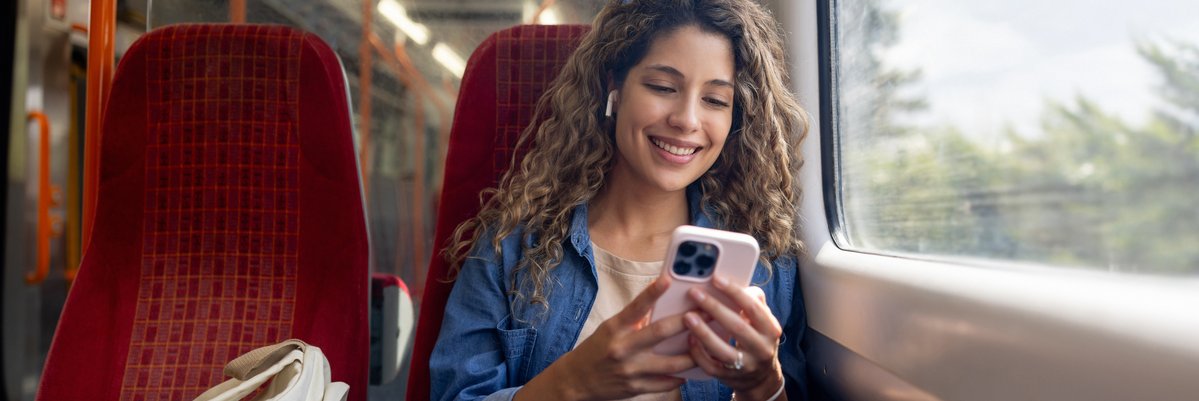 Woman listening to something from her phone on her AirPods.