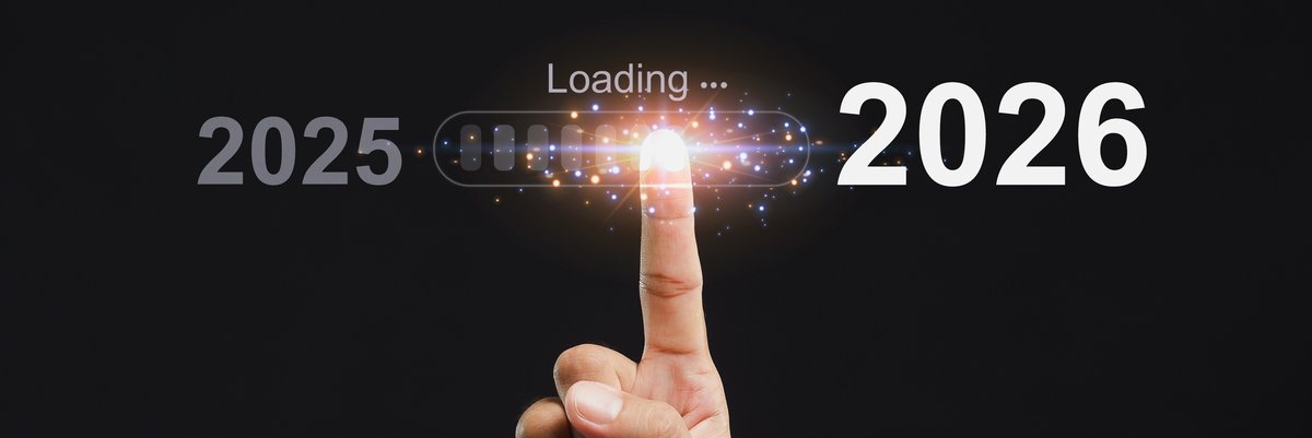 Finger swiping from 2025 to 2026.