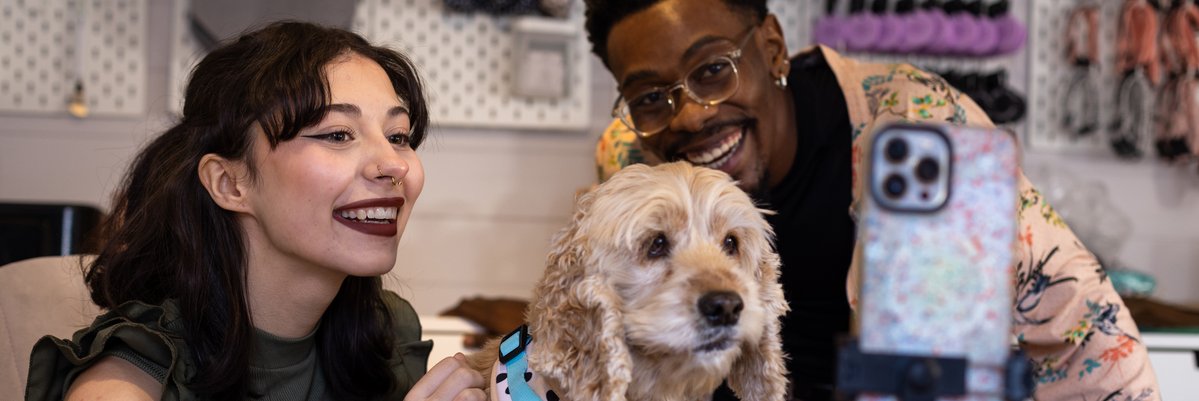 Two small business owners streaming about their pet care product.