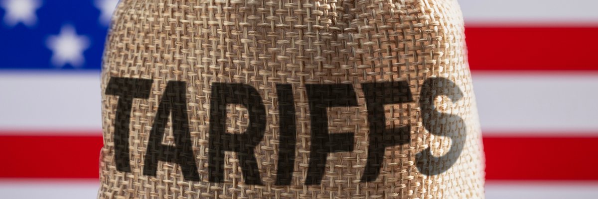 Burlap bag labeled "Tariffs" with American flag background.