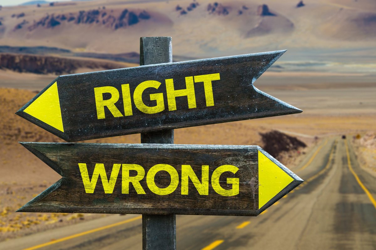 two arrows on a road sign, one saying "right" and the other saying "wrong"