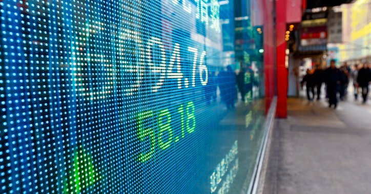Stock prices moving on a screen