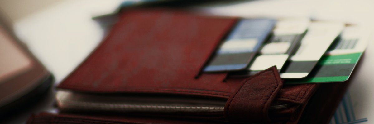 Wallet sitting open showing credit cards